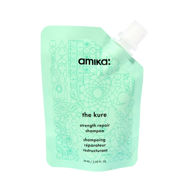 Amika The Kure Strength Repair Shampoo 60 ml.